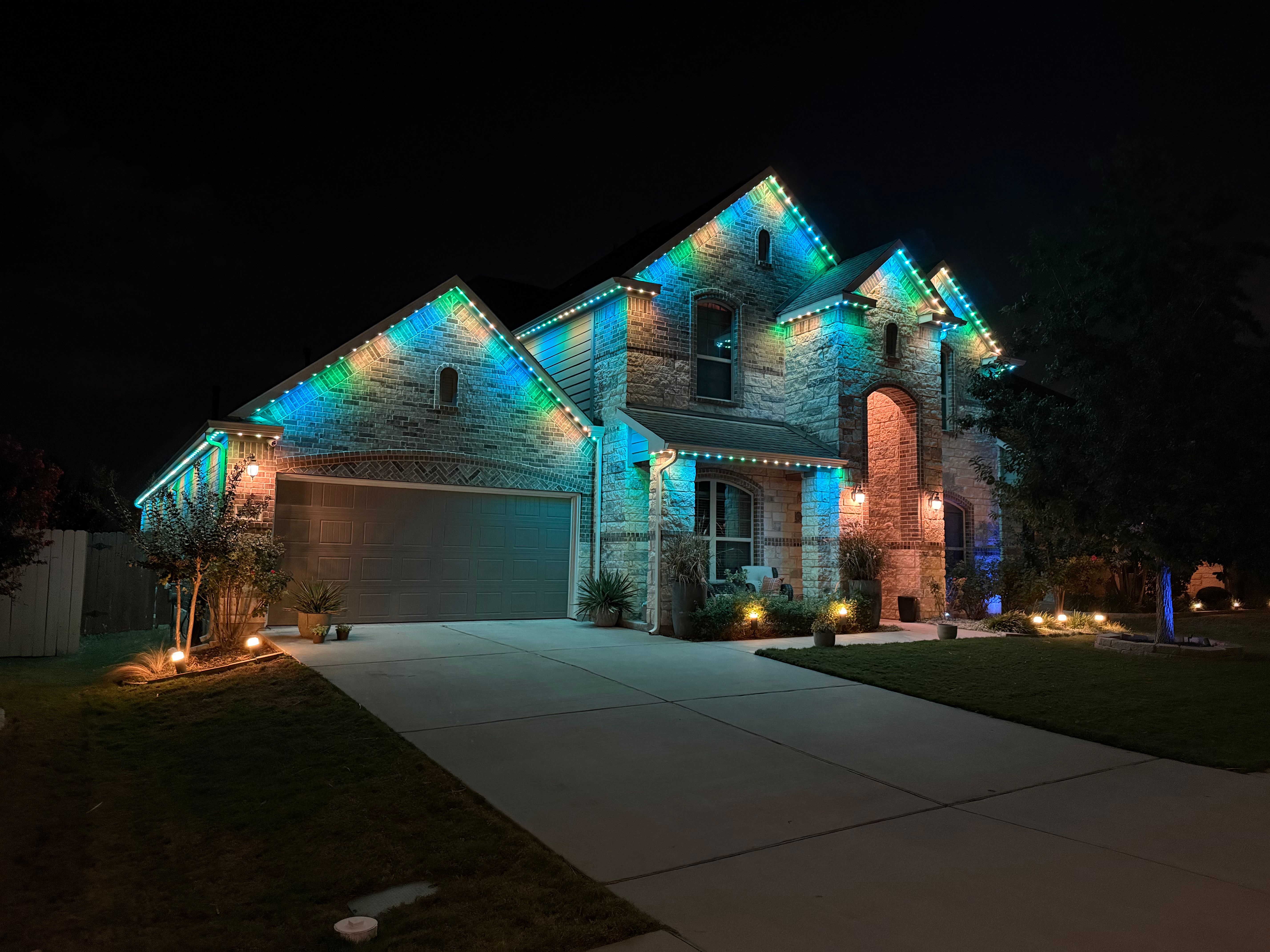 TruLight manufacturer example: Stone home with cool and warm tone LED lighting